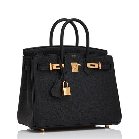 hermes black barrel gold lock handbag|Hermes Birkin 25 Black Togo Gold Hardware .